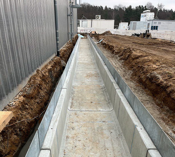 Concrete cable trench for the electrical power connection between H<sub>2</sub>-in-the-Loop, H<sub>2</sub>Rail and the Power Hardware-in-the-Loop system.