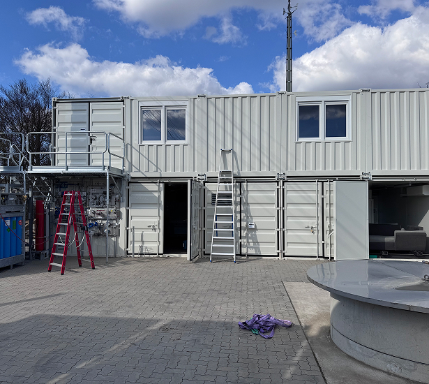 Two-storey container facility during construction of the second floor of H<sub>2</sub>-in-the-Loop.